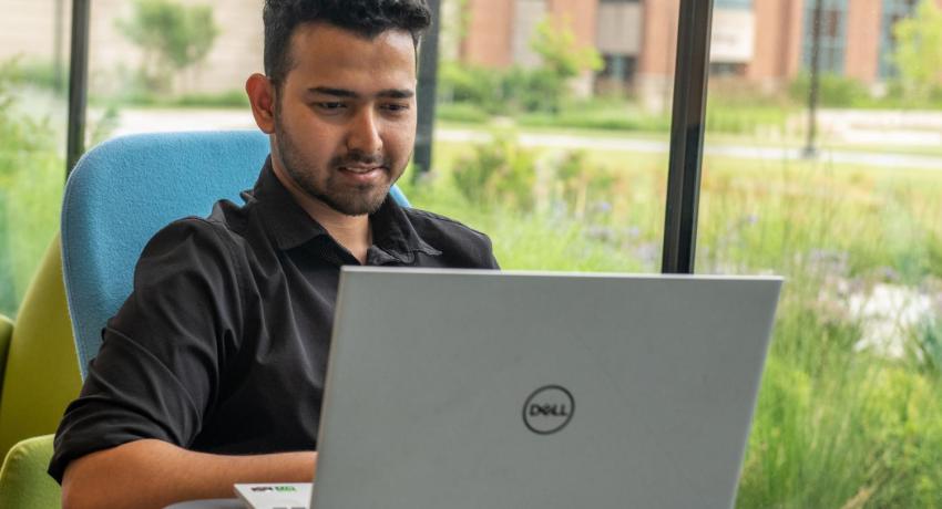 Ankan Dutta on laptop